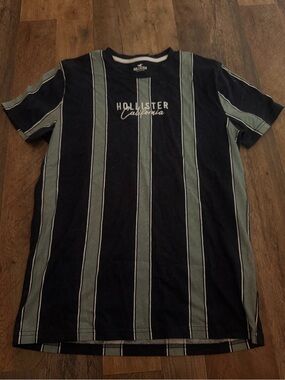 Hollister Black Tee with Green Vertical Stripes